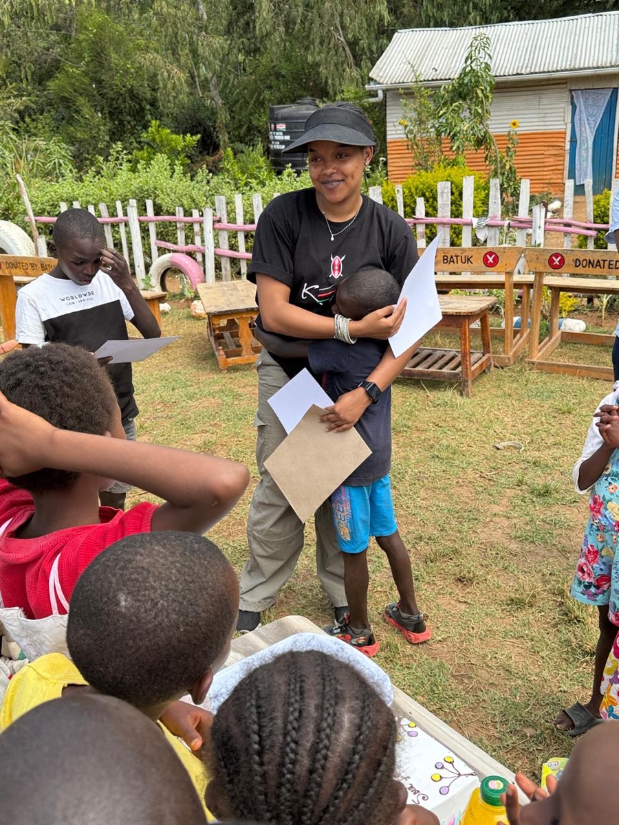 Founder engaging children at a Bright Spaces activity